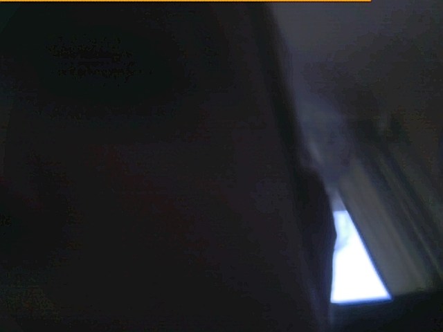 Behind the chair